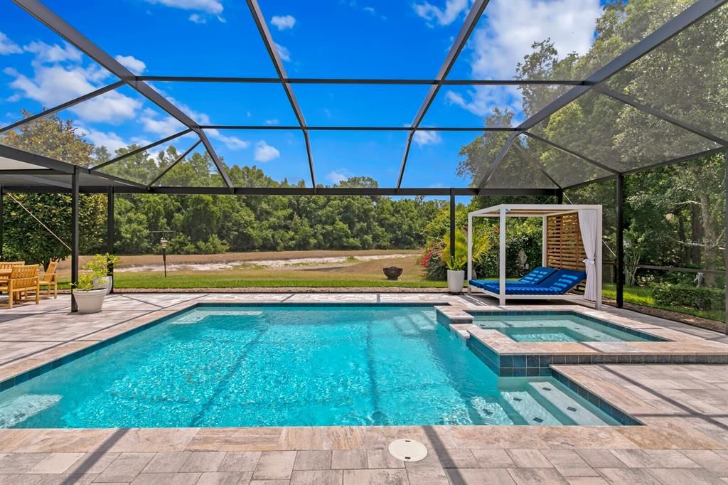 Simply stunning new pool with super screen offering unobstructed water & conservation views