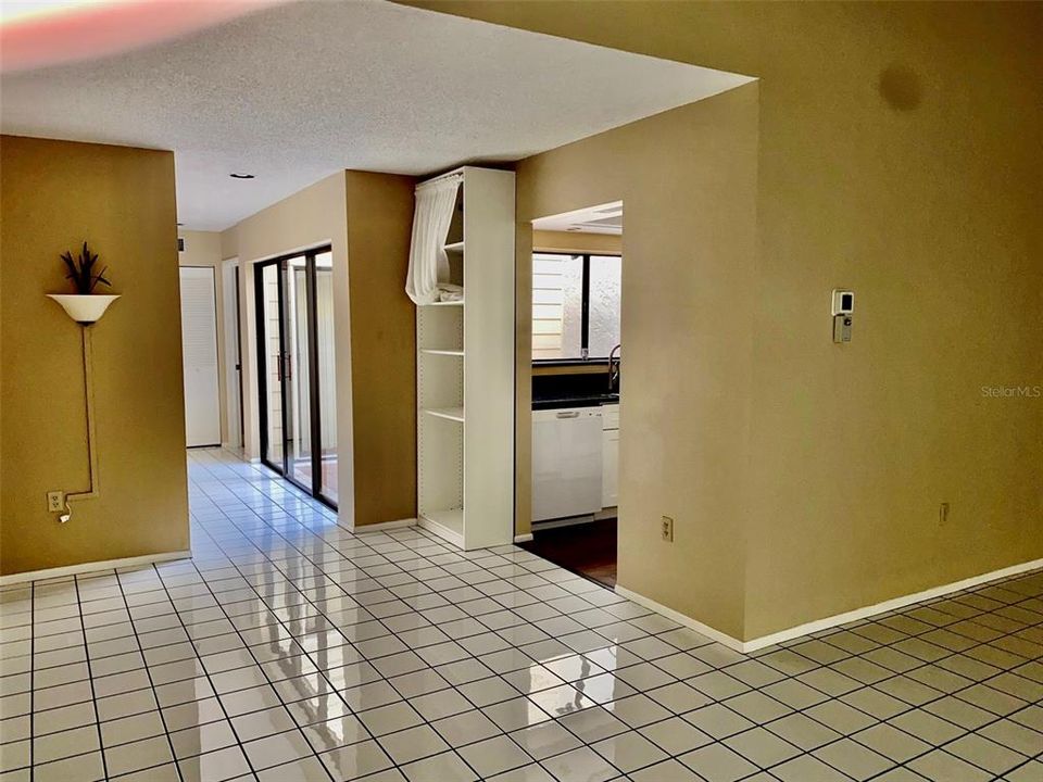 View from living room towards hallway and kitchen