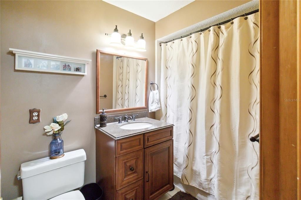 Bathroom 3 in Hallway with shower tub combo