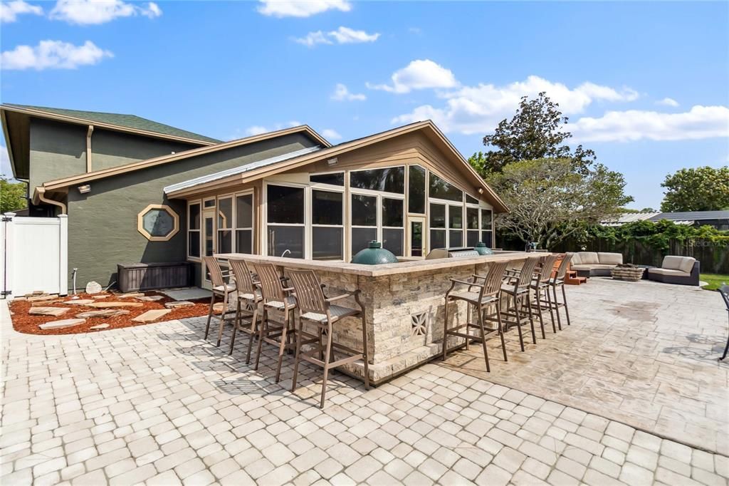 Outside Summer Kitchen with plenty of seating for guest