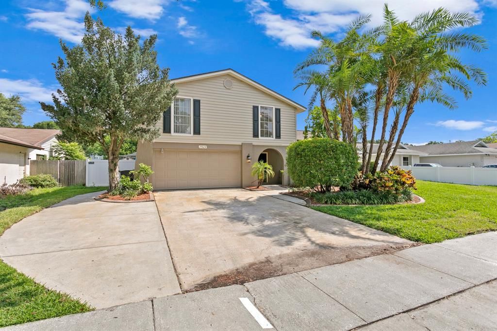 This beautifully maintained home features an oversized driveway for extra parking