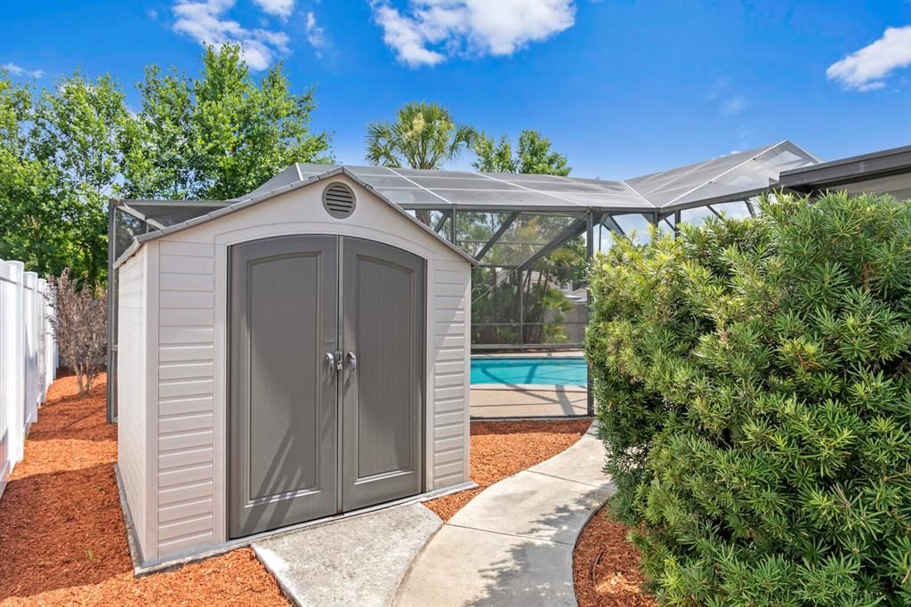 Vinyl storage shed in the backyard