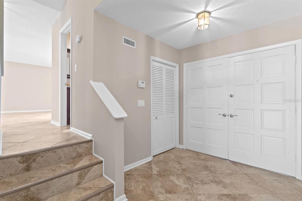 The double entry doors opens to a spacious foyer