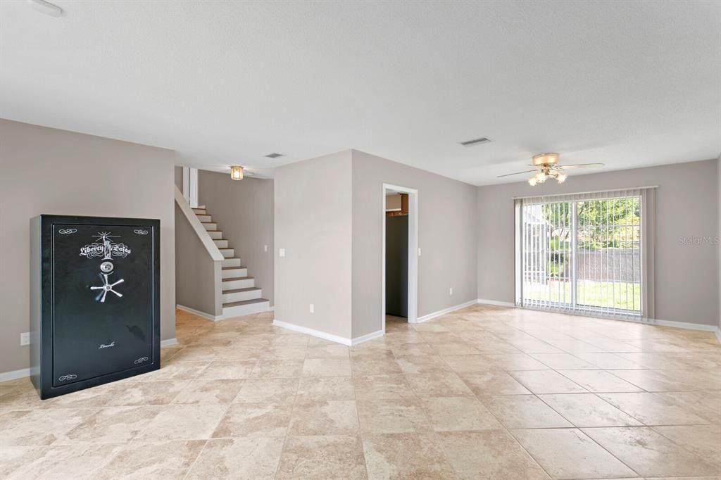 Open-concept floor plan includes a combined living & dining room