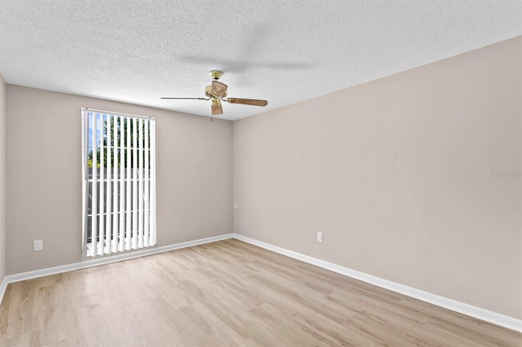 4th bedroom w/new LVT floors