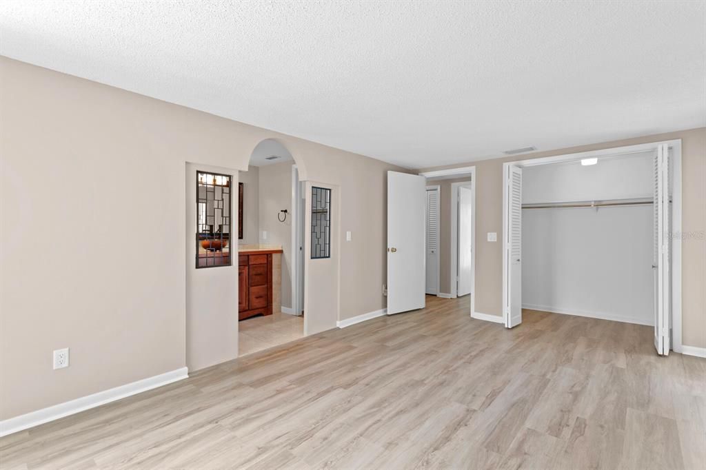 Dual walk-in closets in the primary bedroom