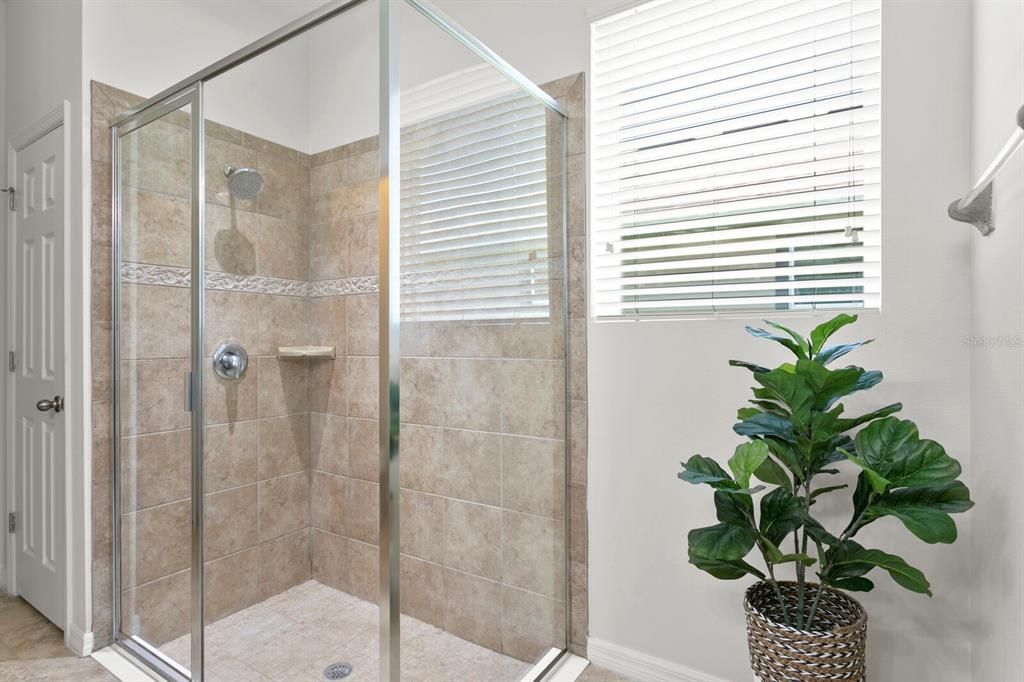 Large walk-in shower in the primary bath