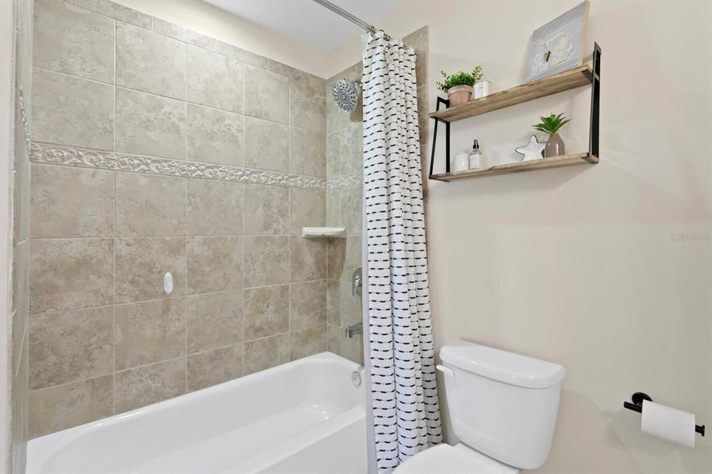 2nd floor full bath has a tub/shower combo