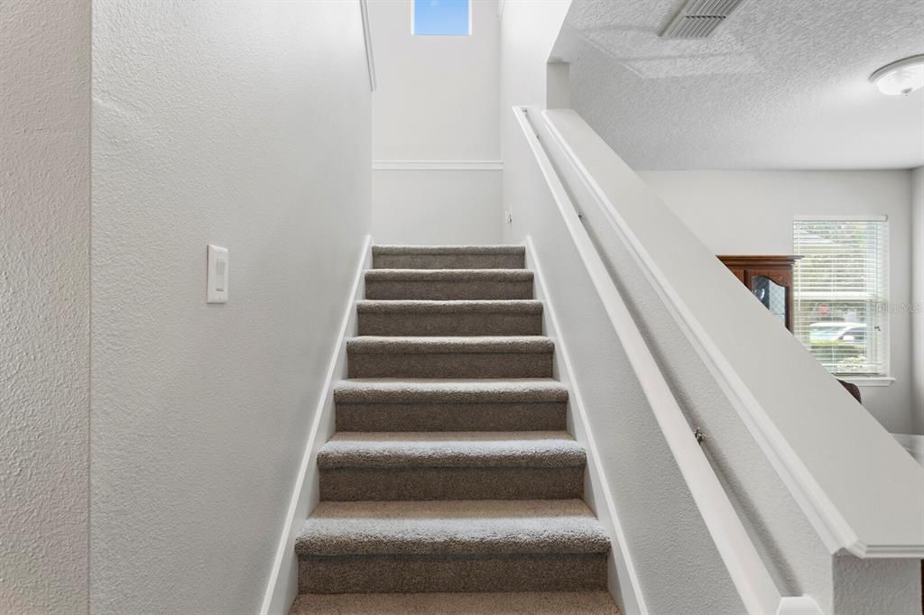 Stairs to 2nd floor and all 4 bedrooms