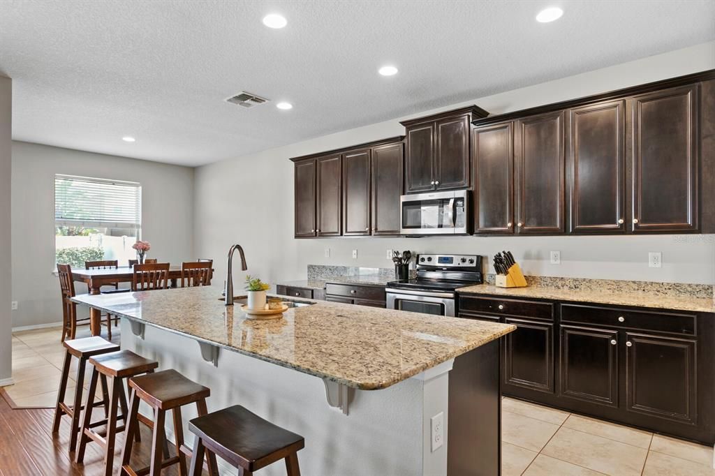 Large kitchen island with granite counters