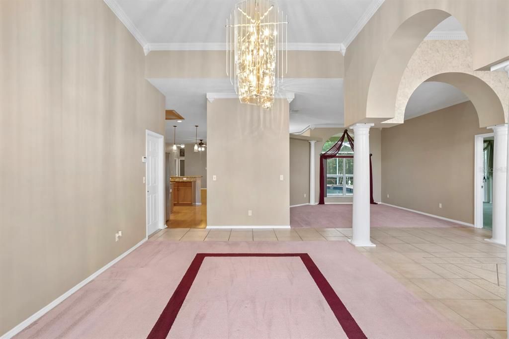 Views from the dining room towards the foyer and kitchen