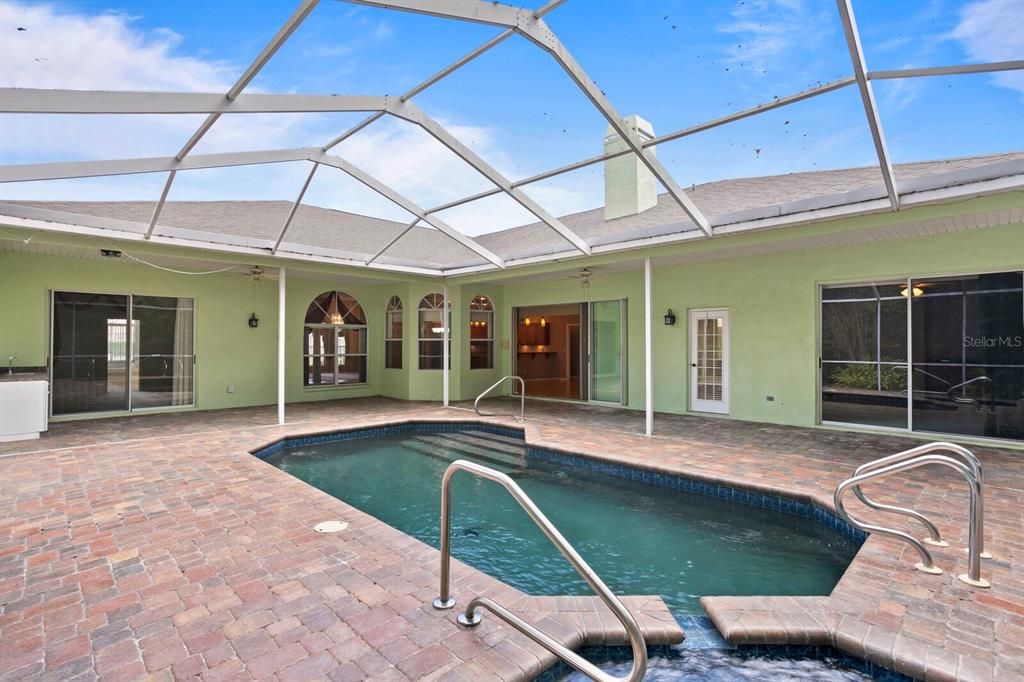 Fantastic private pool with paver deck & spillover spa