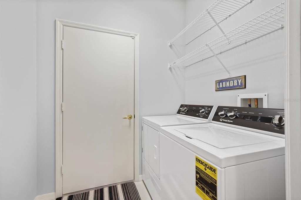 Laundry room with door to the garage