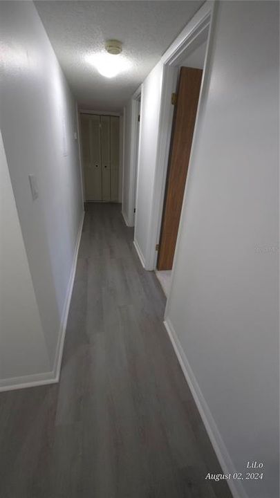 Hallway to bedrooms And 2nd Bathroom