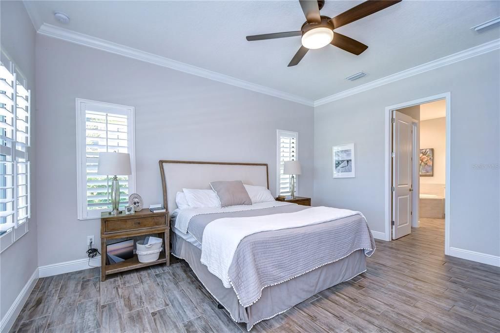 Plantation shutters, beautiful flooring & crown are some of the features!