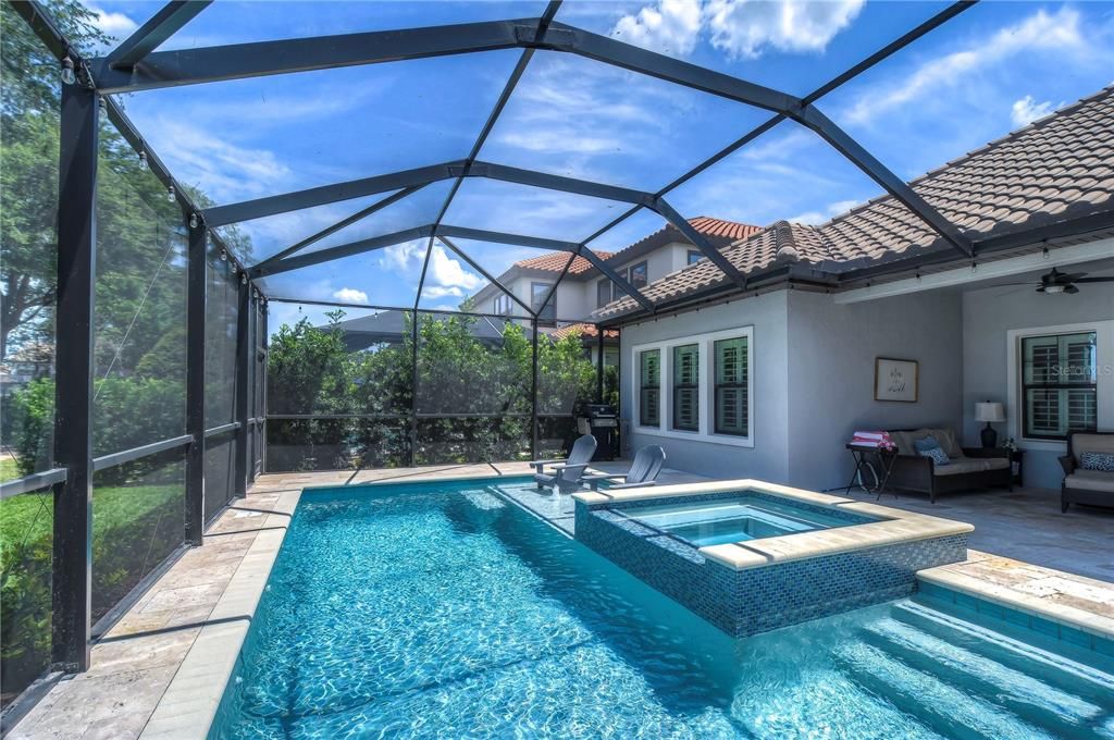 Heated saltwater pool with large sun shelf!