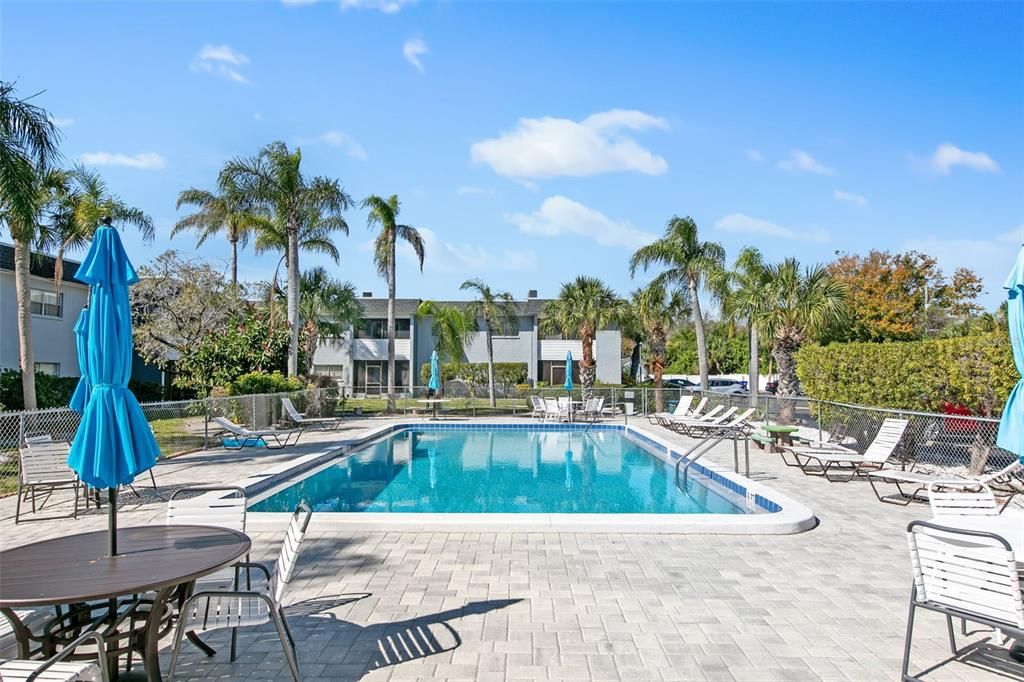 Meet your neighbors and bring your family and guests over for a swim in the newly surfaced pool a few steps out your door