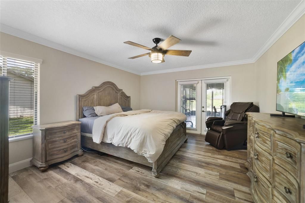 Ideal SPLIT BEDROOMS deliver a tranquil retreat in your PRIMARY SUITE, another bright space with its own access to the lanai and a WALK-IN CLOSET and private en-suite bath behind a sliding barn door.