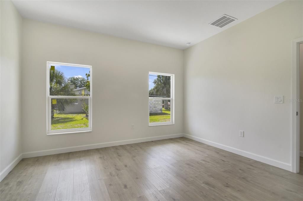 PRIMARY BEDROOM.