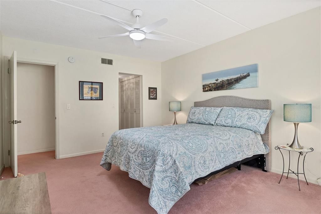 Dressing area with storage off of owners bedroom