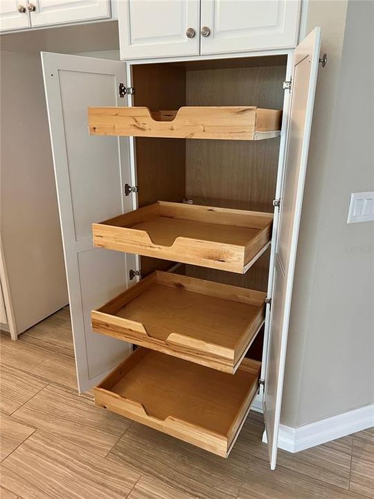 Look at this upgraded pantry!  You'll never have to reach for the back of your pantry again!  Each drawer is 3"-4" deep!