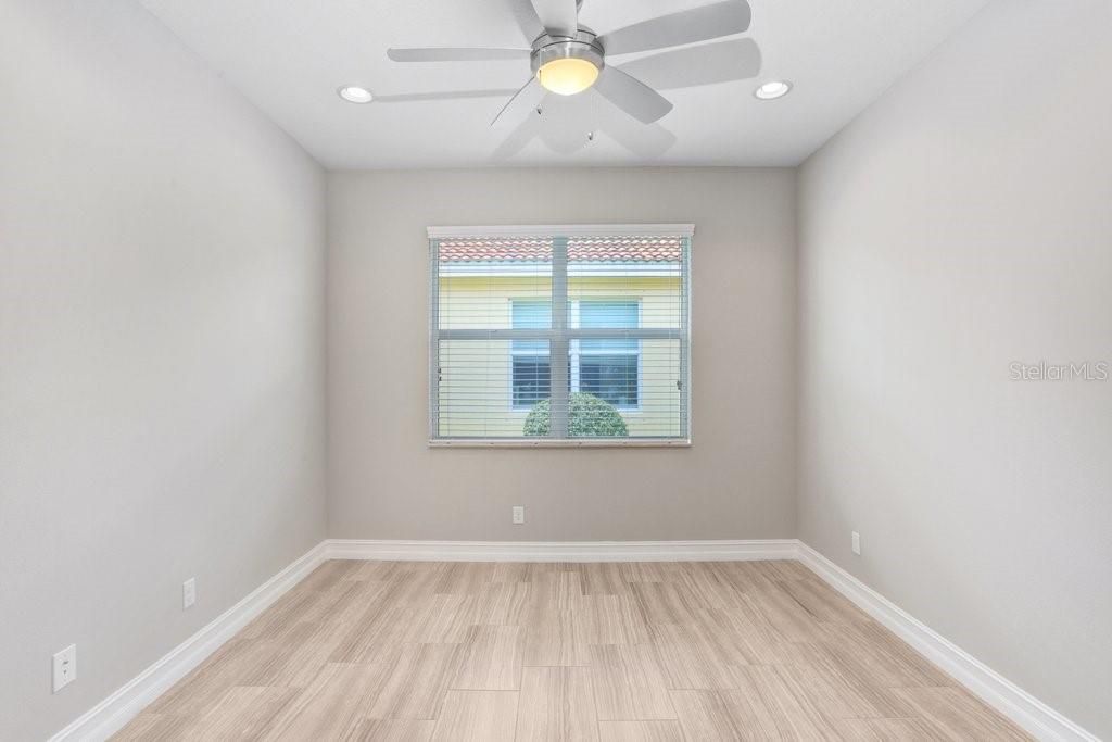 The Den/Office has a double french door entry and a lighted ceiling fan.