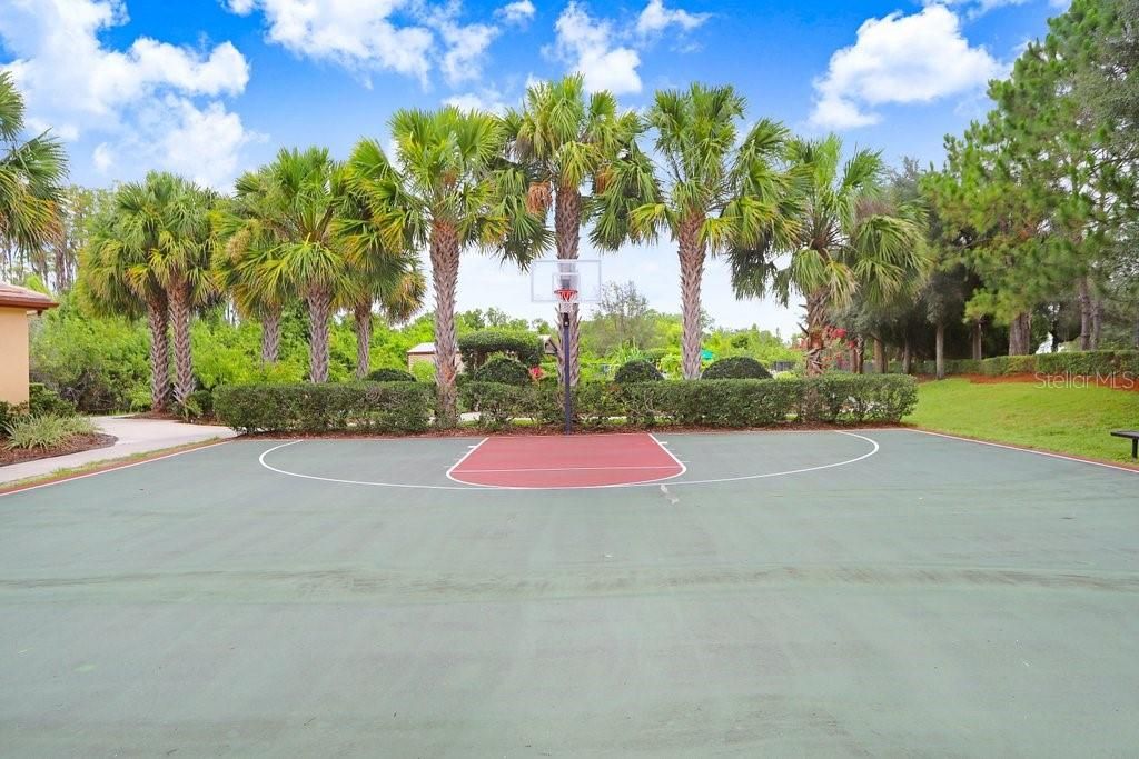 A Basketball court!  Valenica Lakes has SO many amenities so you can stay ACTIVE & BUSY!