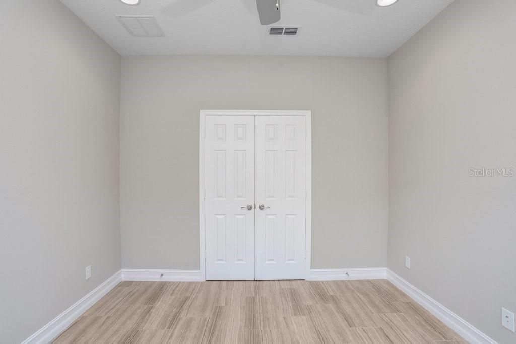 The Den/Office has a double french door entry and a lighted ceiling fan.