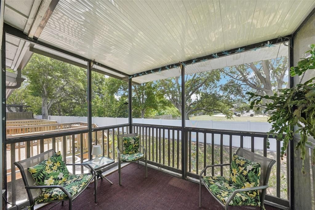 Private screen enclosed back porch to enjoy the morning and evening breeze