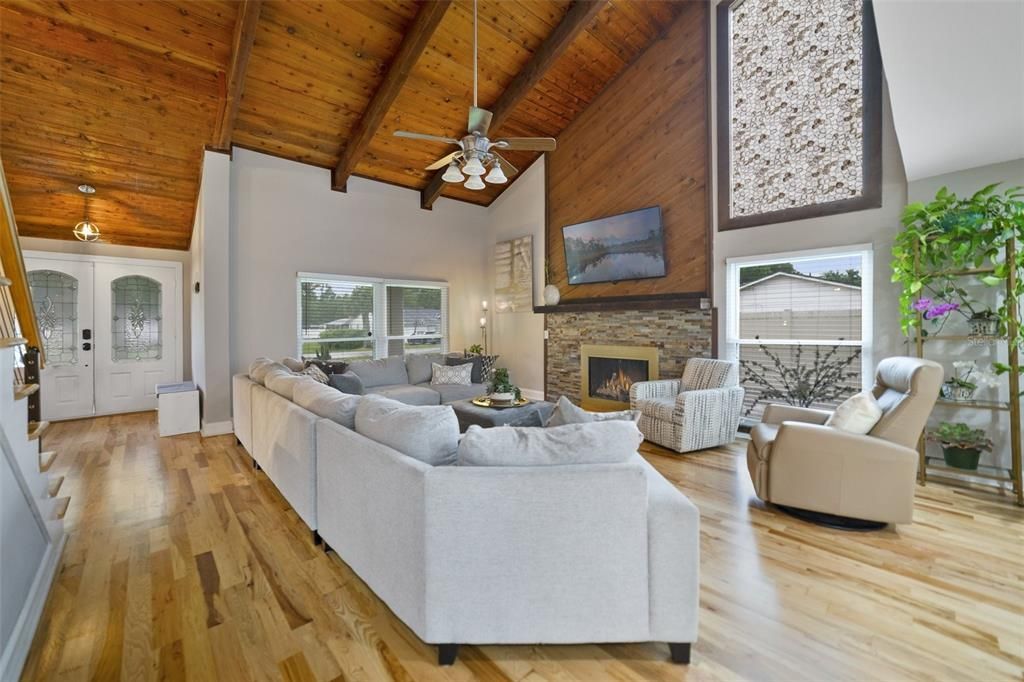 Step inside and prepare to be amazed, there are WOOD FLOORS THROUGHOUT, soaring NATURAL WOOD CEILINGS, tons of NATURAL LIGHT and the modern updates blend seamlessly with traditional elements.