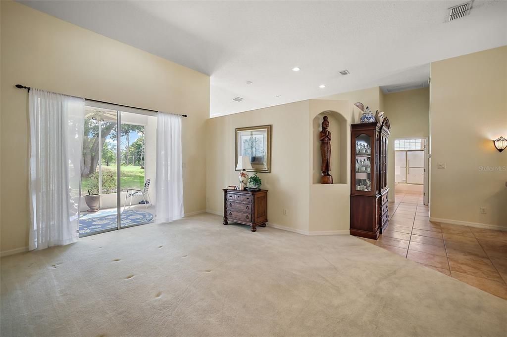 Formal Living Room - 14X19 - has Sliders to Screened Lanai, inviting shaded views of the Golf Course.