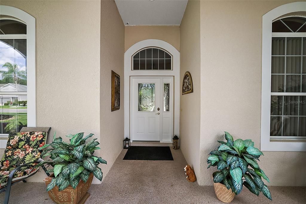 Spacious, Covered Front Porch with Inviting Entrance.