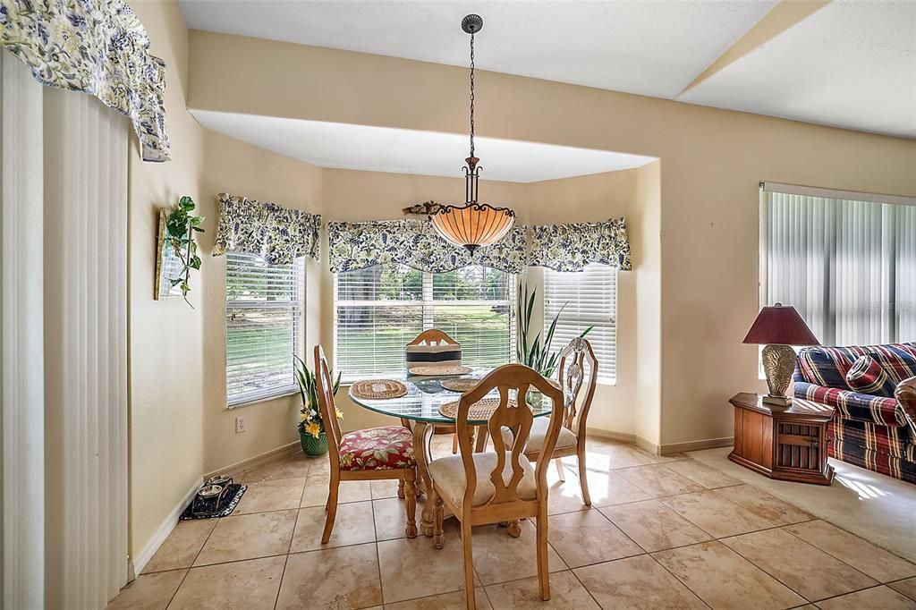 Kitchen Dinette - 12X12 - with Sliders to Screened Lanai & Open to Family Room.