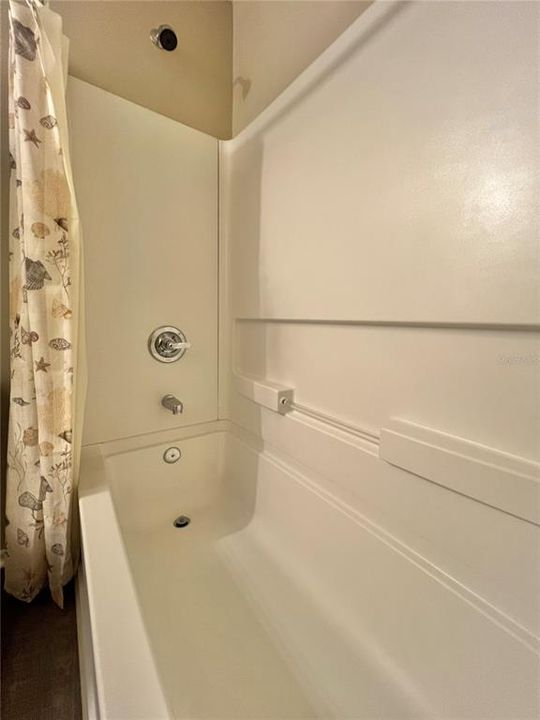 Extremely clean shower stall!!!  It's acrylic and VERY easy to maintain clean!