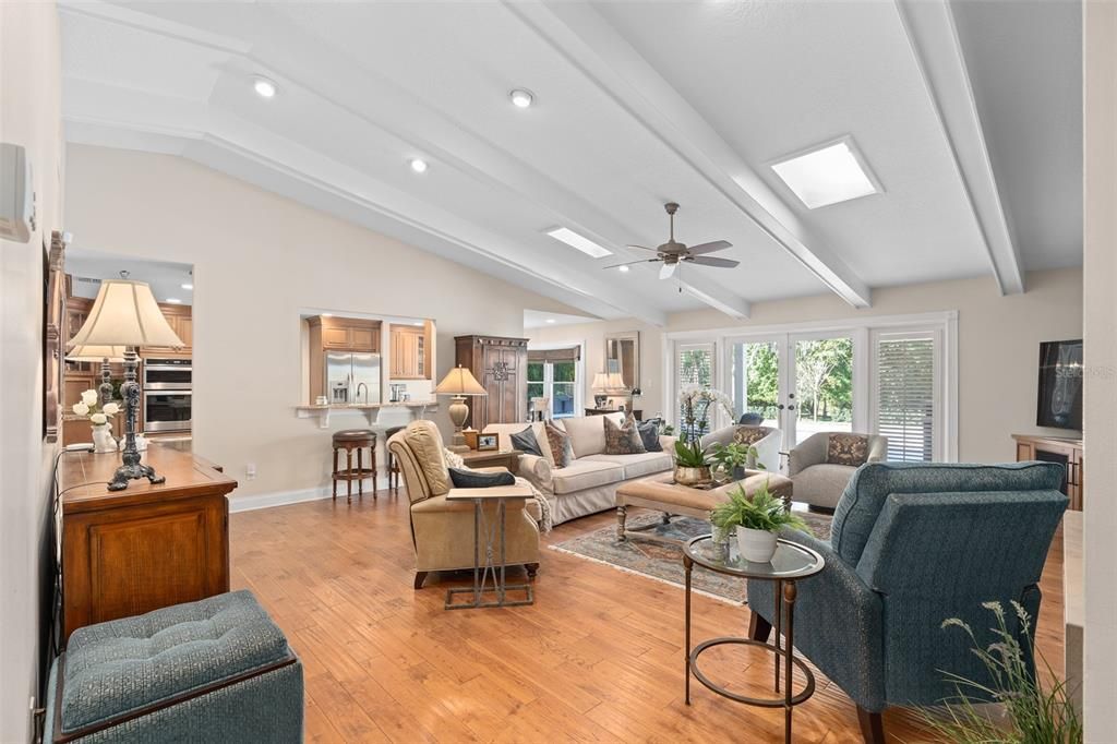 Family Room With Vaulted Beamed Ceilings
