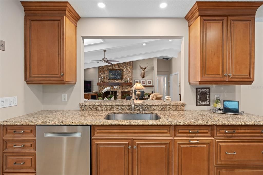 Kitchen open to Family Room with counter bar w/stools