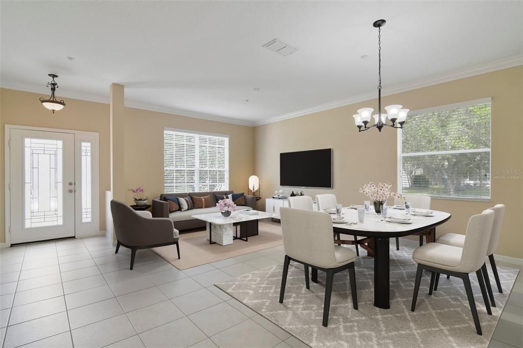 Your foyer opens up to versatile formal living and dining spaces, topped with the CROWN MOLDING you will find throughout the downstairs as well as TILE FLOORS for easy maintenance. Virtually Staged.