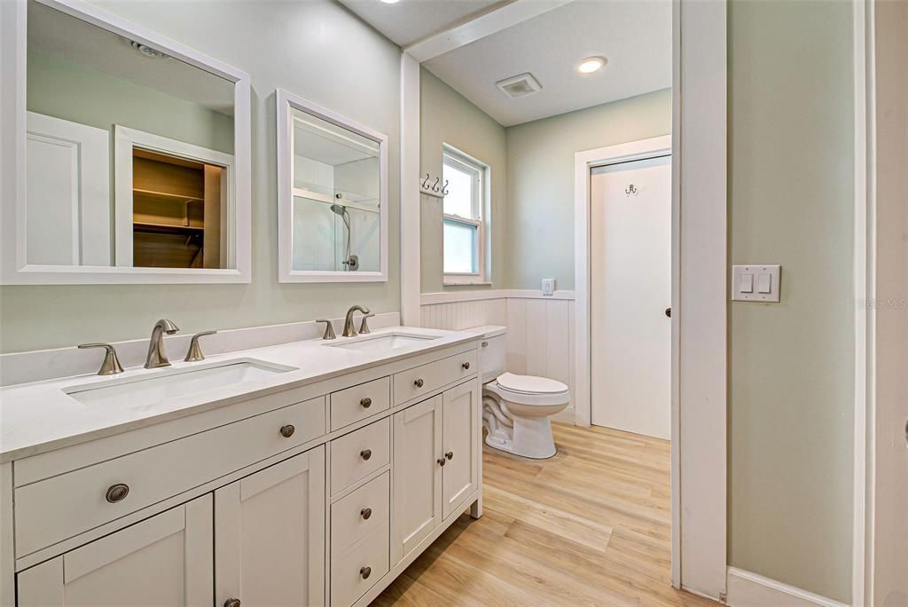 Primary Bath with double vanity and walk in shower