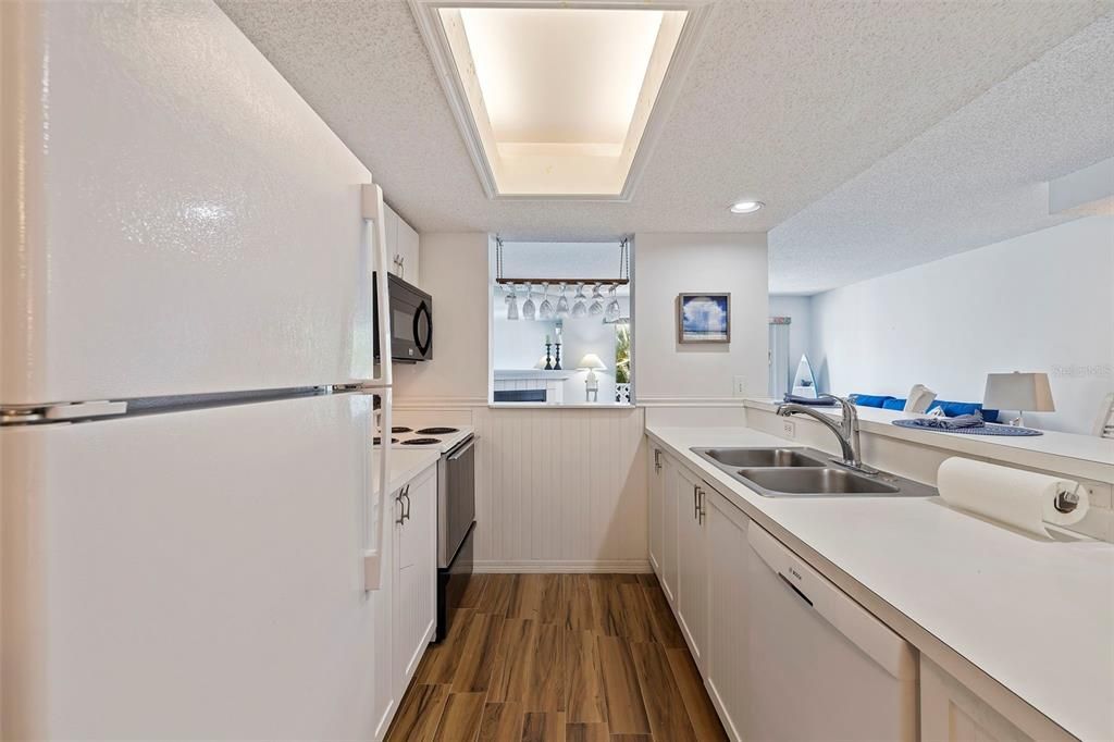 Bosch dishwasher, refrigerator stays. Wider gallery kitchen