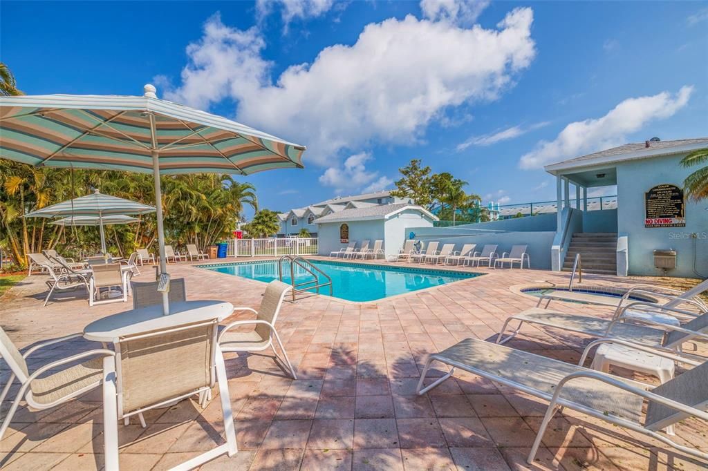 Lovely pool deck with grilling, outdoor lavatories, and lighting for evenings by the pool as well