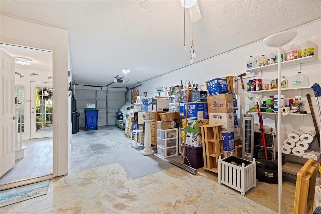 Oversized garage, roomy to walk around parked auto and storage space