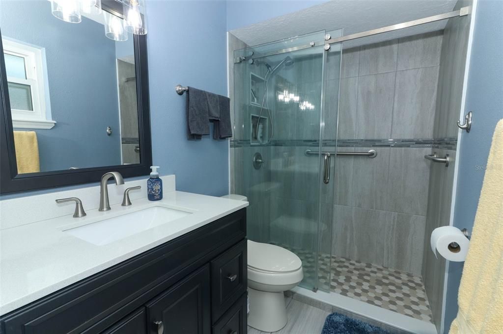 Newly Remodeled Hall  Bathroom opens to Pool area!!