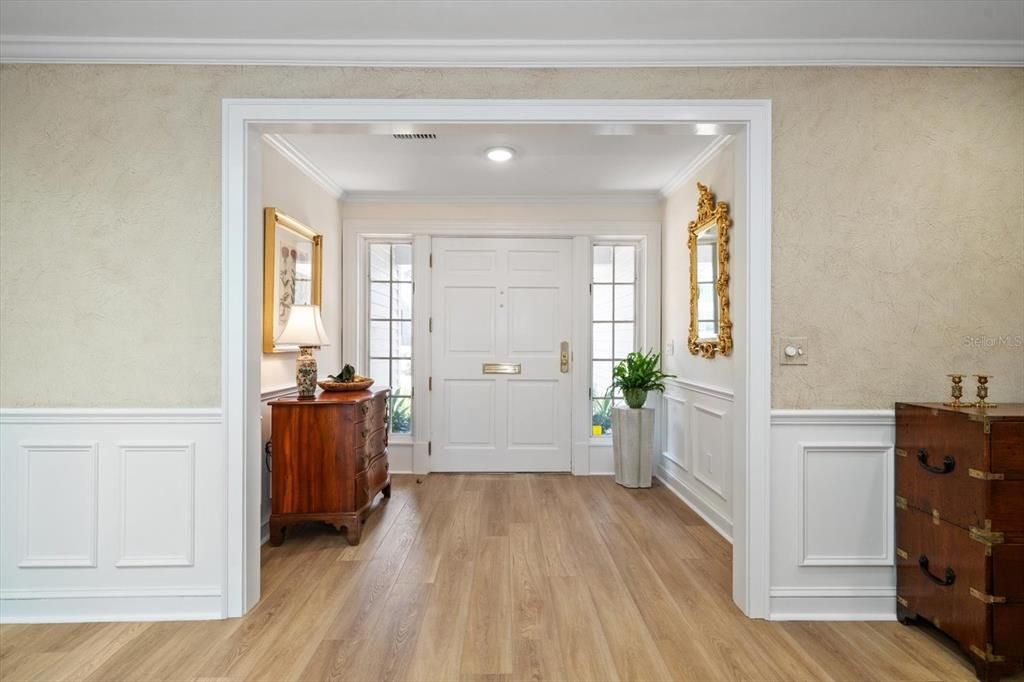 Entry with extensive molding add rich details and provide a lovely first impression!