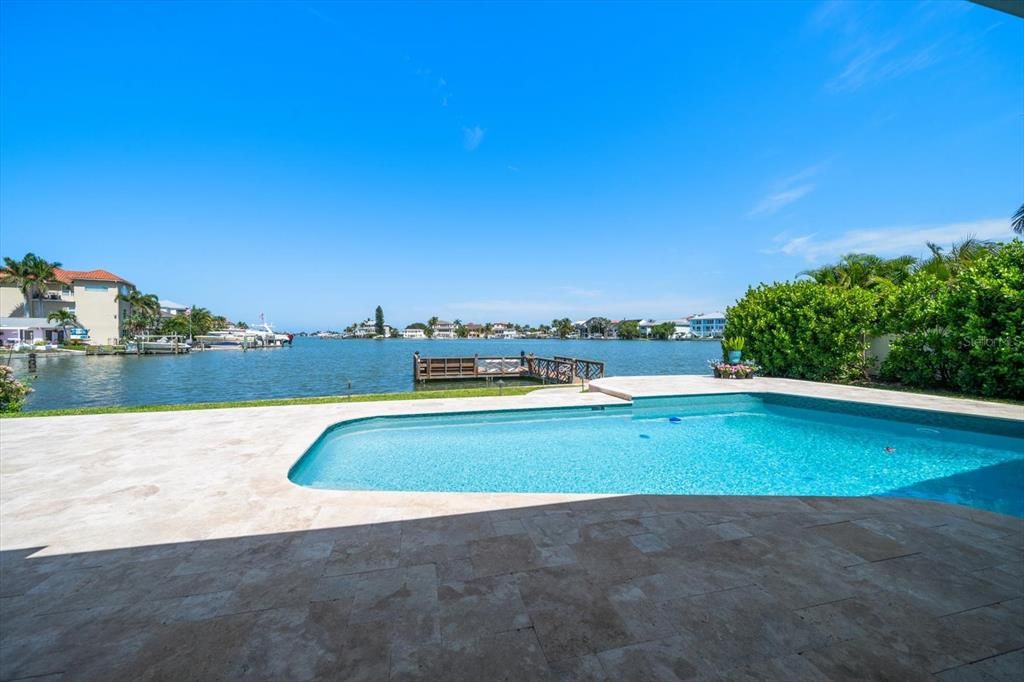 Private pool area overlooks dock and wide open views to the intracoastal waterway.