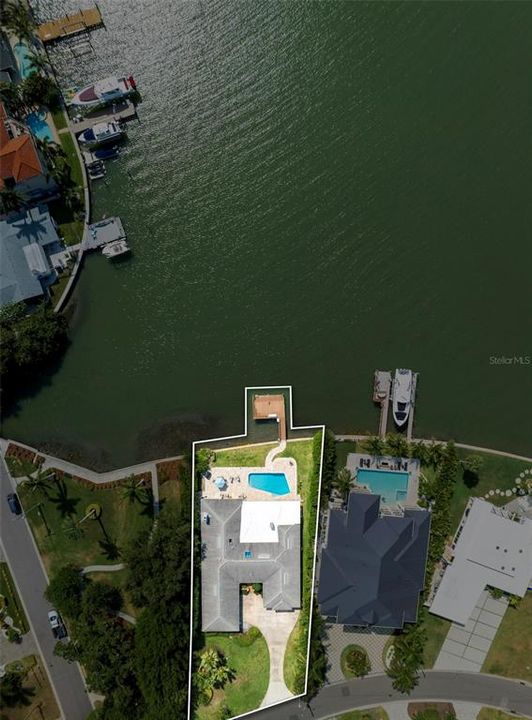 Over 1/3 acre, this property is perfectly positioned with protected dockage to capture the amazing open views of Clearwater Harbor. Neighborhood park to the south offers additional privacy!