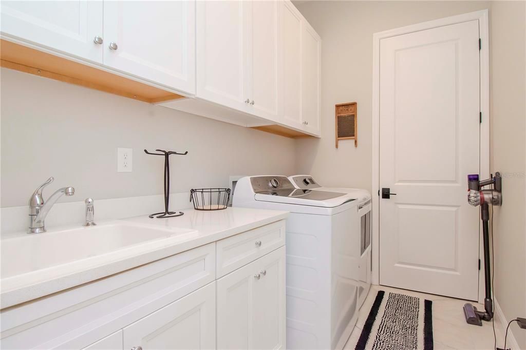 Amazing Laundry Room with Laundry Sink