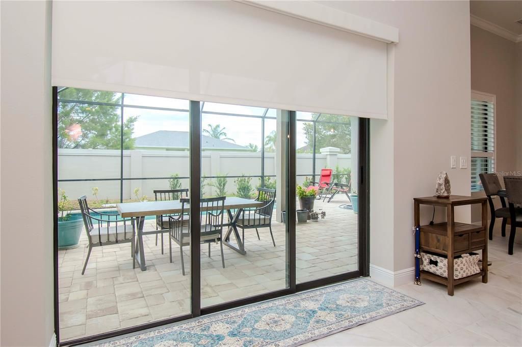 Triple Sliding Doors with Remote Shade