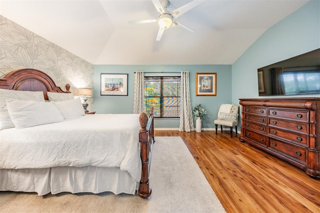 Large Master Bedroom, updated flooring and ceiling fan.