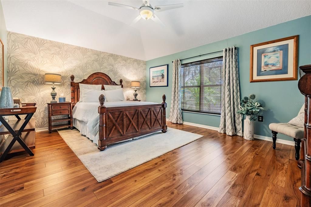 Large Master Bedroom, updated flooring and ceiling fan.