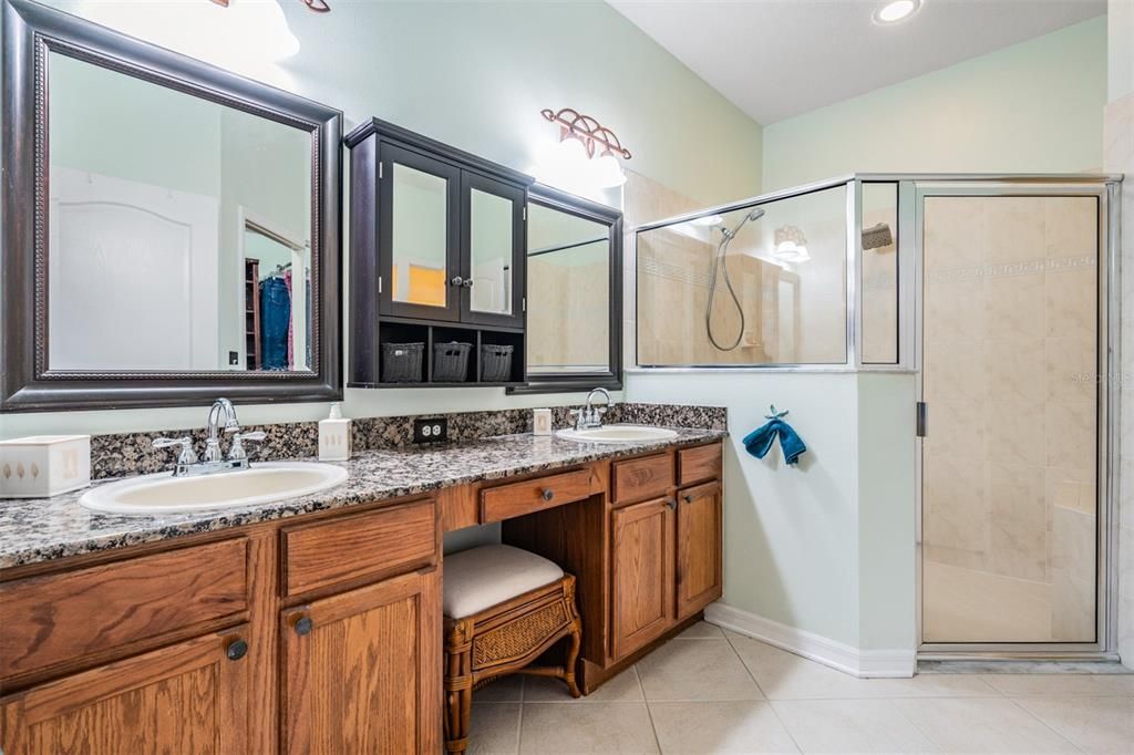 Master Bathroom, double vanities, granite countertops, spacious shower.